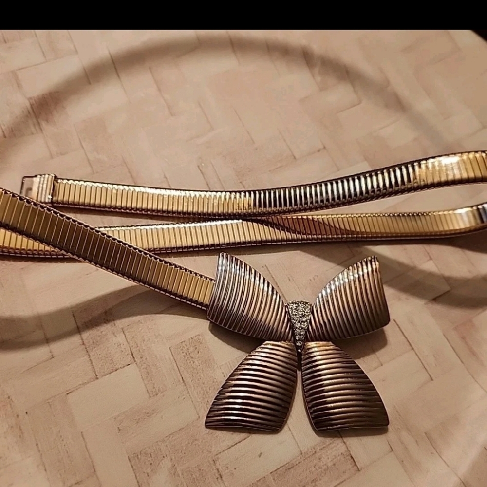 Vtg Park Lane Flexible Front Clip Bow Belt stretch gold tone